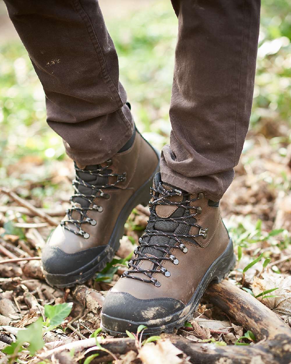 Dark Brown coloured Aigle Laforse Boots on forest background
