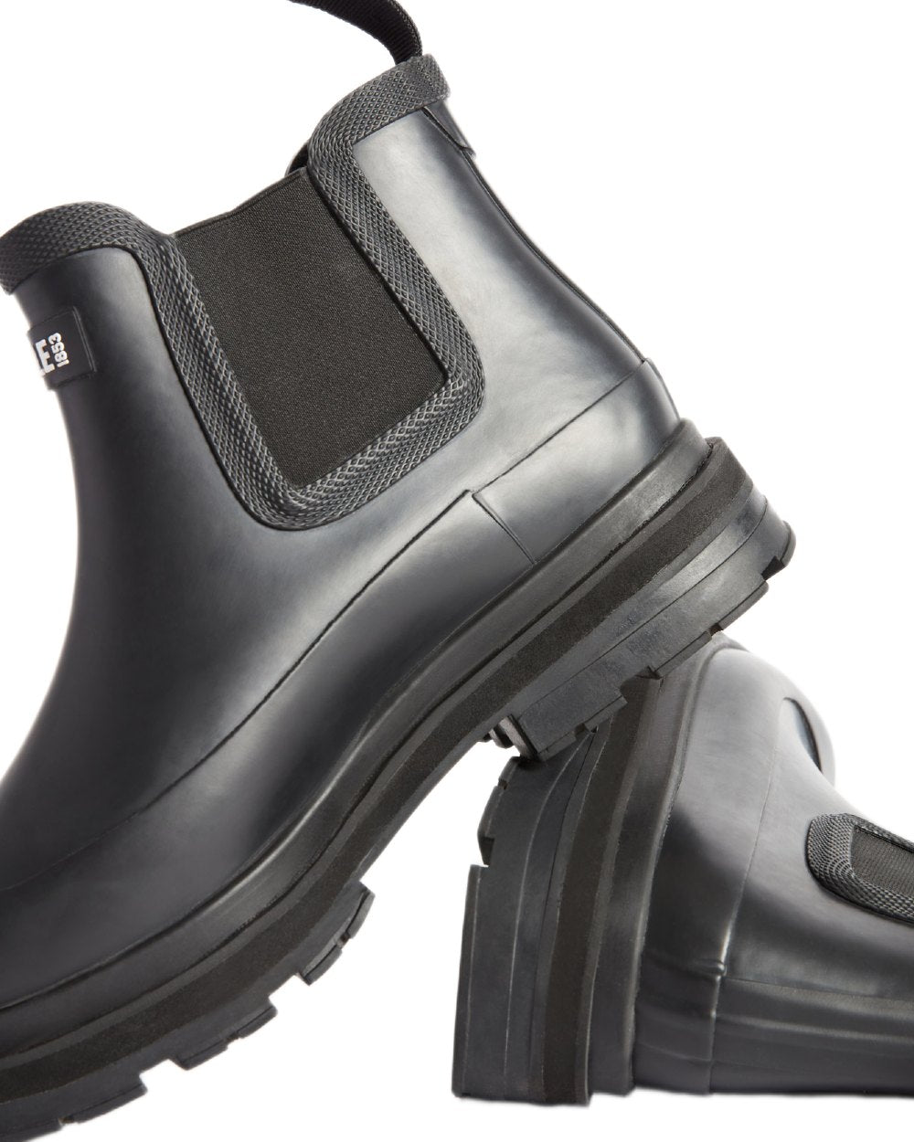 Noir coloured Aigle Soft Rain 2 Ankle Boots on white background