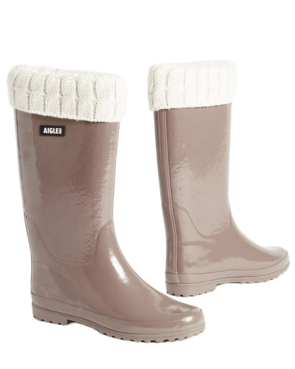 Chestnut coloured Aigle Womens Eliosa Fur Lined Wellingtons on white background
