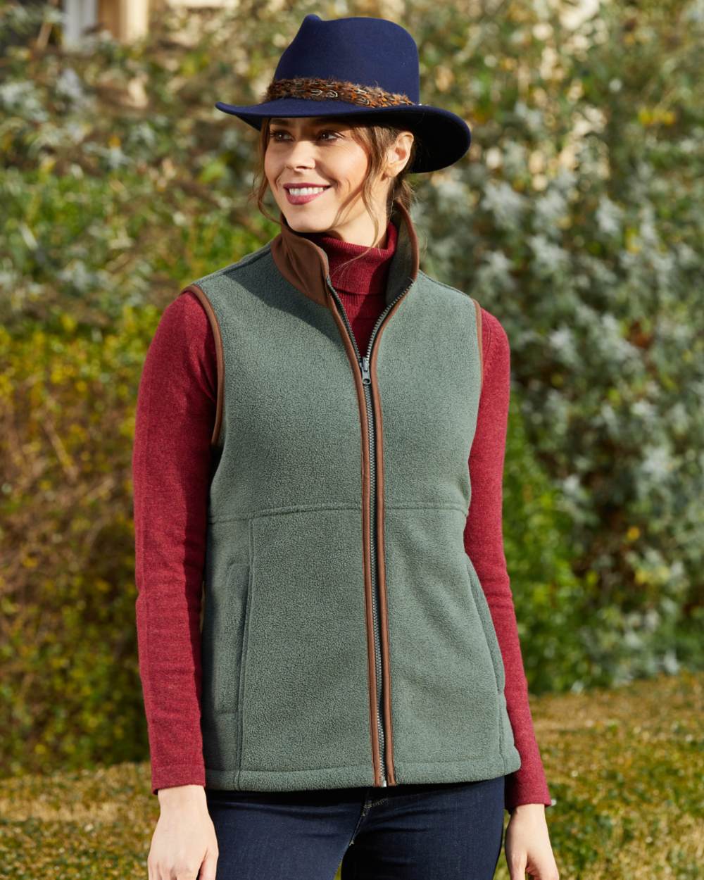 Cedar Coloured Alan Paine Aylsham Ladies Fleece Gilet on leafy background