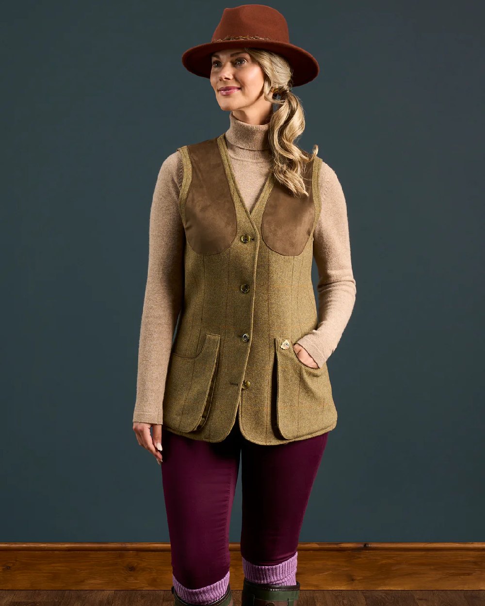 Grove coloured Alan Paine Combrook Ladies Tweed Shooting Waistcoat on indoor background