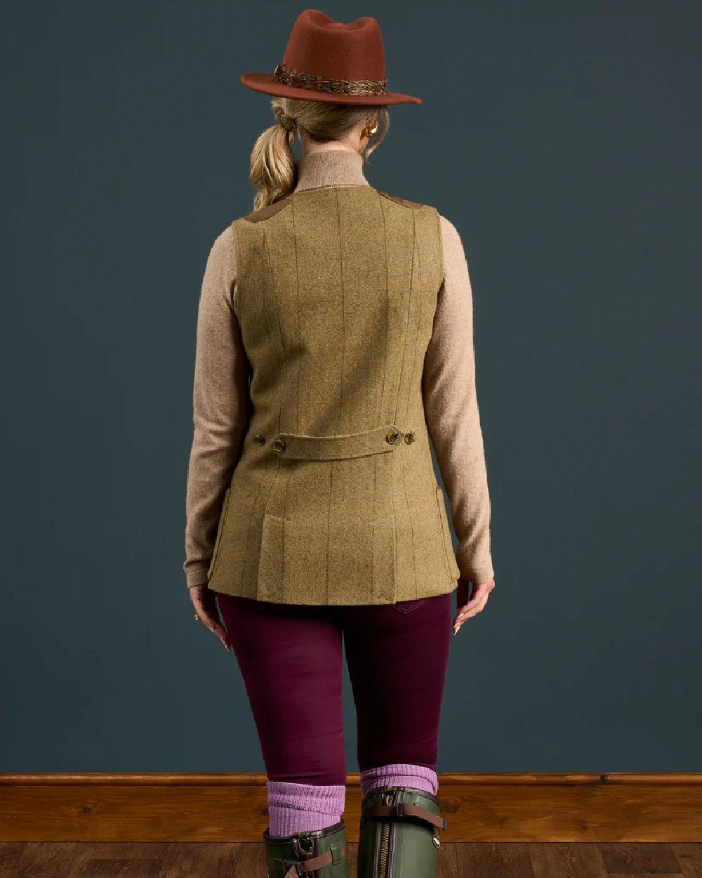 Grove coloured Alan Paine Combrook Ladies Tweed Shooting Waistcoat on indoor background
