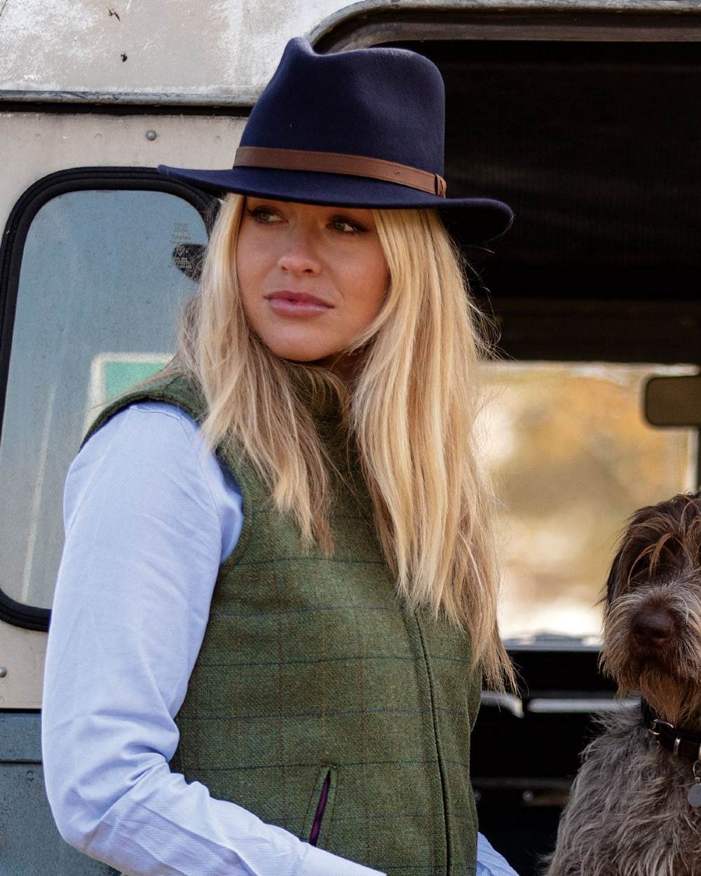 Navy coloured Alan Paine Ladies Richmond Felt Hat on blurry background
