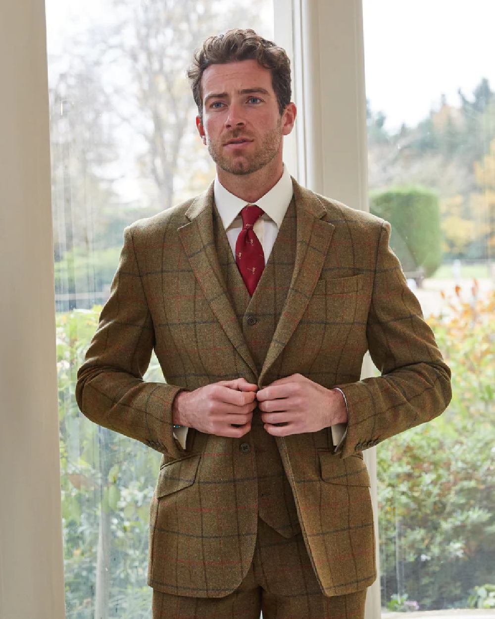 Thyme coloured Alan Paine Mens Combrook Tweed Lined Back Waistcoat on window background