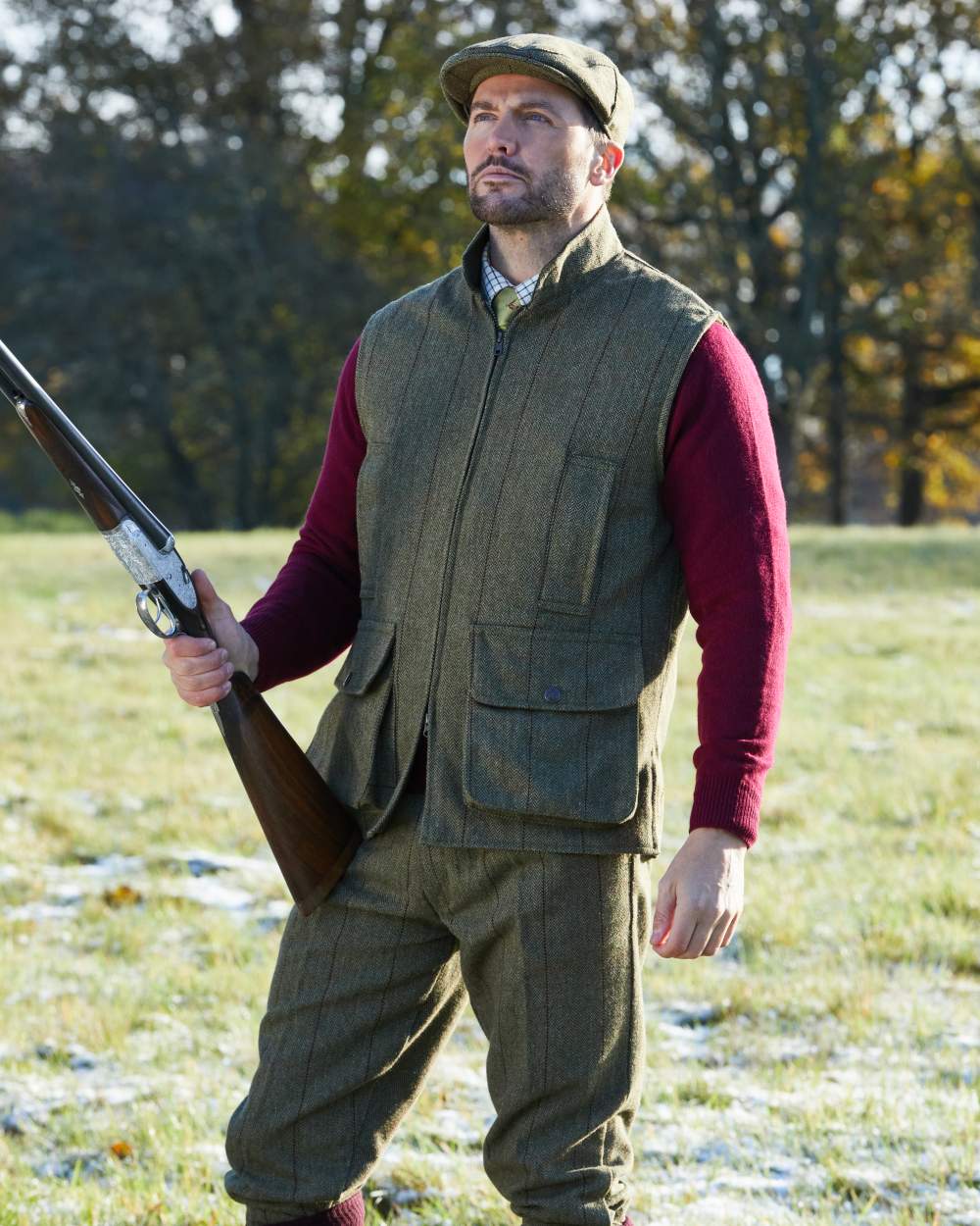 Oak coloured Alan Paine Rutland Tweed Waistcoat on forest background