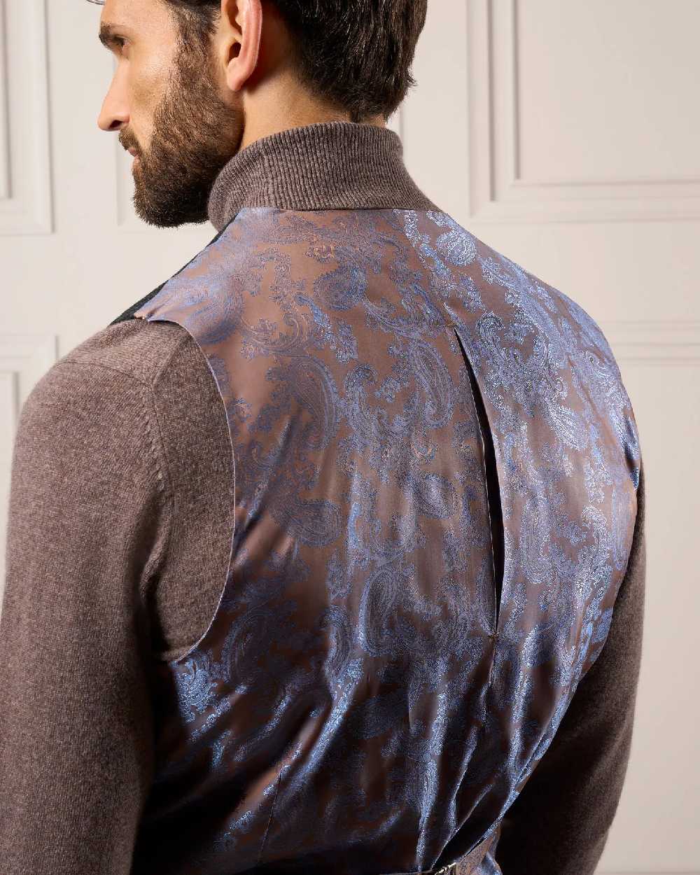 Green Check Coloured Alan Paine Surrey Mens Tweed Lined Waistcoat on wall background