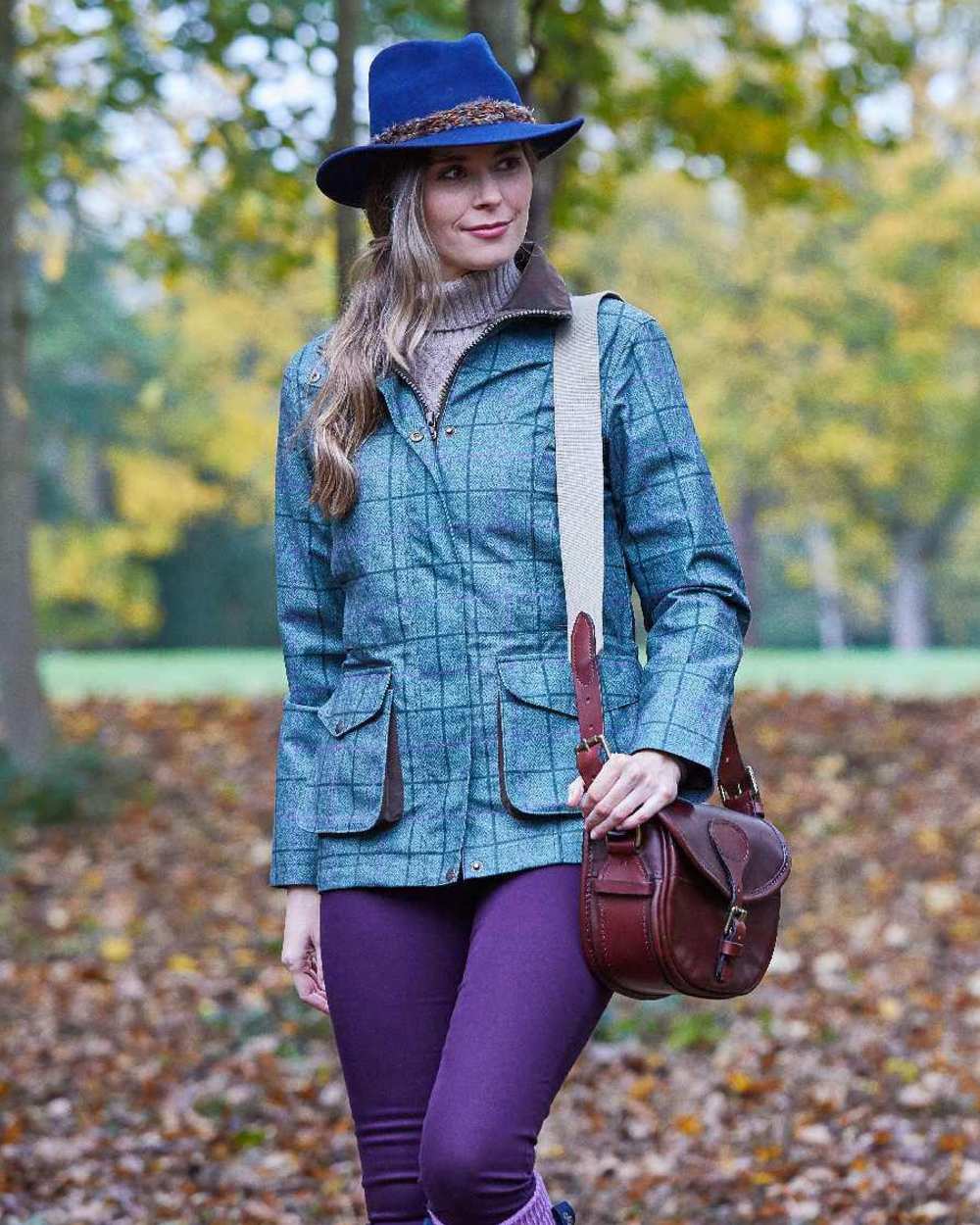 Seagrass coloured Alan Paine Womens Didsmere Coat on forest background