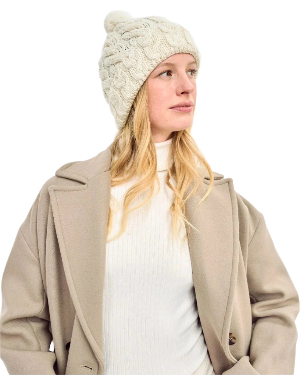 Cream Coloured Aran Chunky Knit Bobble Hat on white background