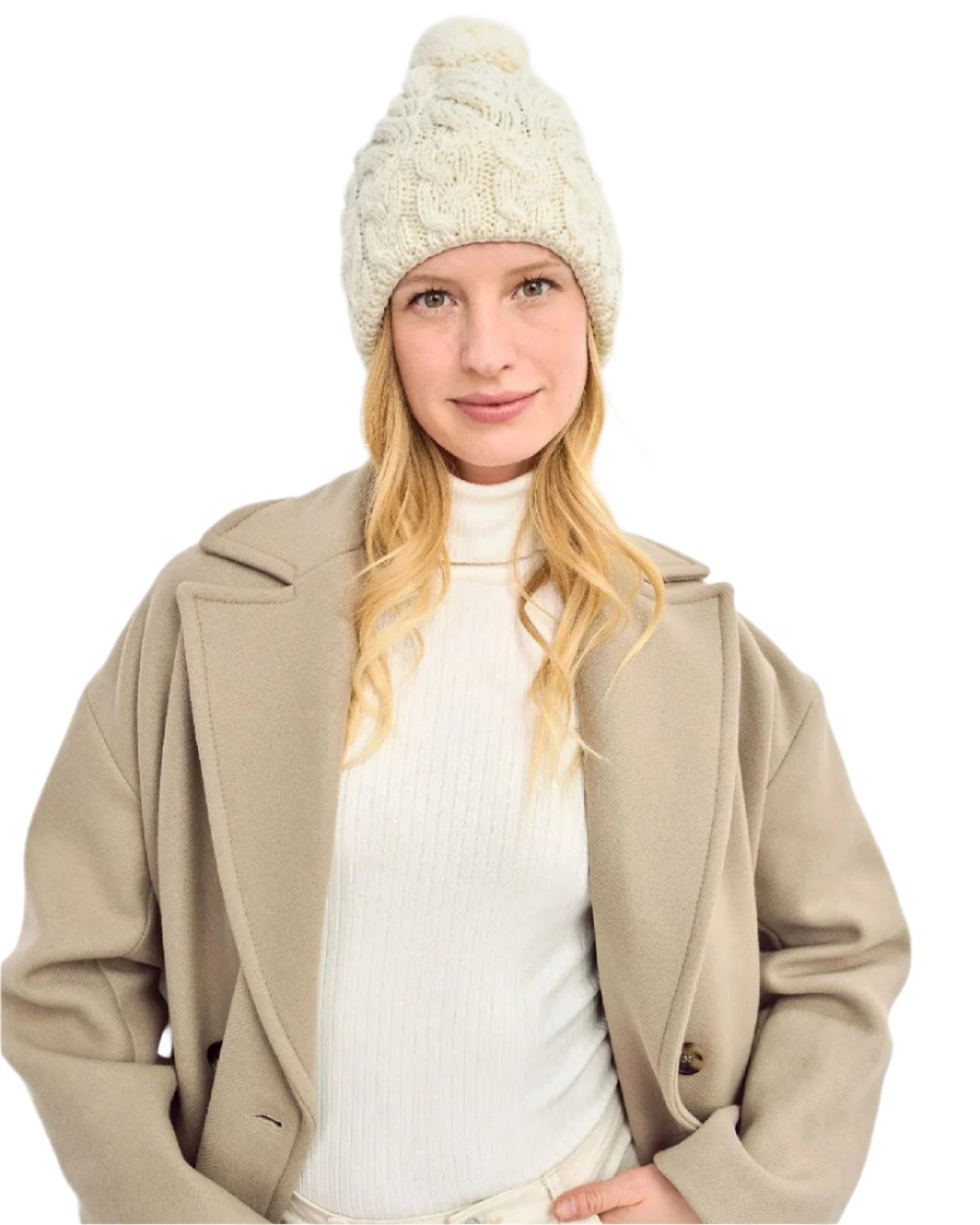 Cream Coloured Aran Chunky Knit Bobble Hat on white background