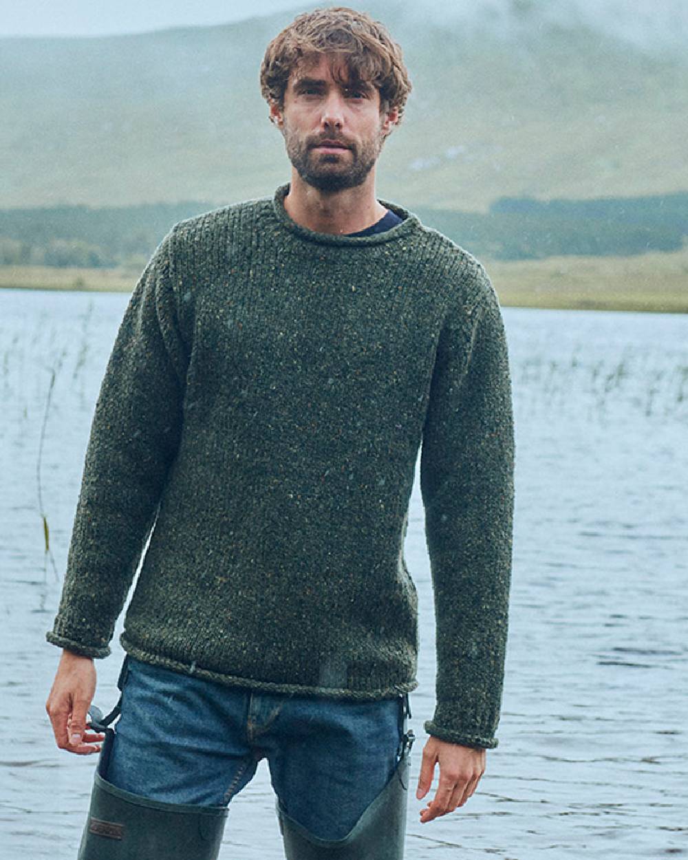 Green Coloured Aran Donegal Wool Crew Neck Sweater on lake background