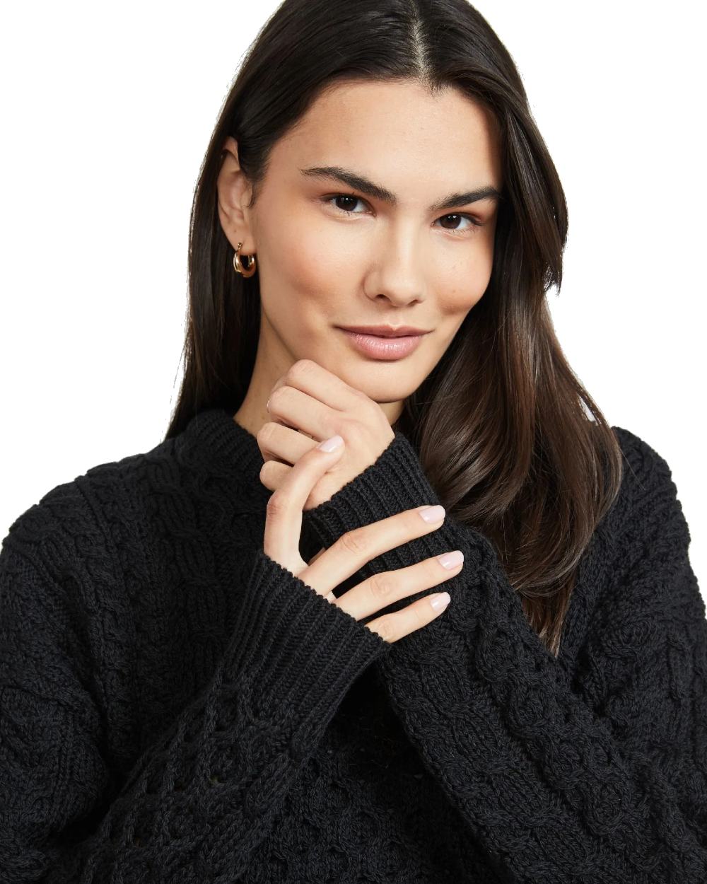 Black Coloured Aran Inisheer Traditional Sweater on white background