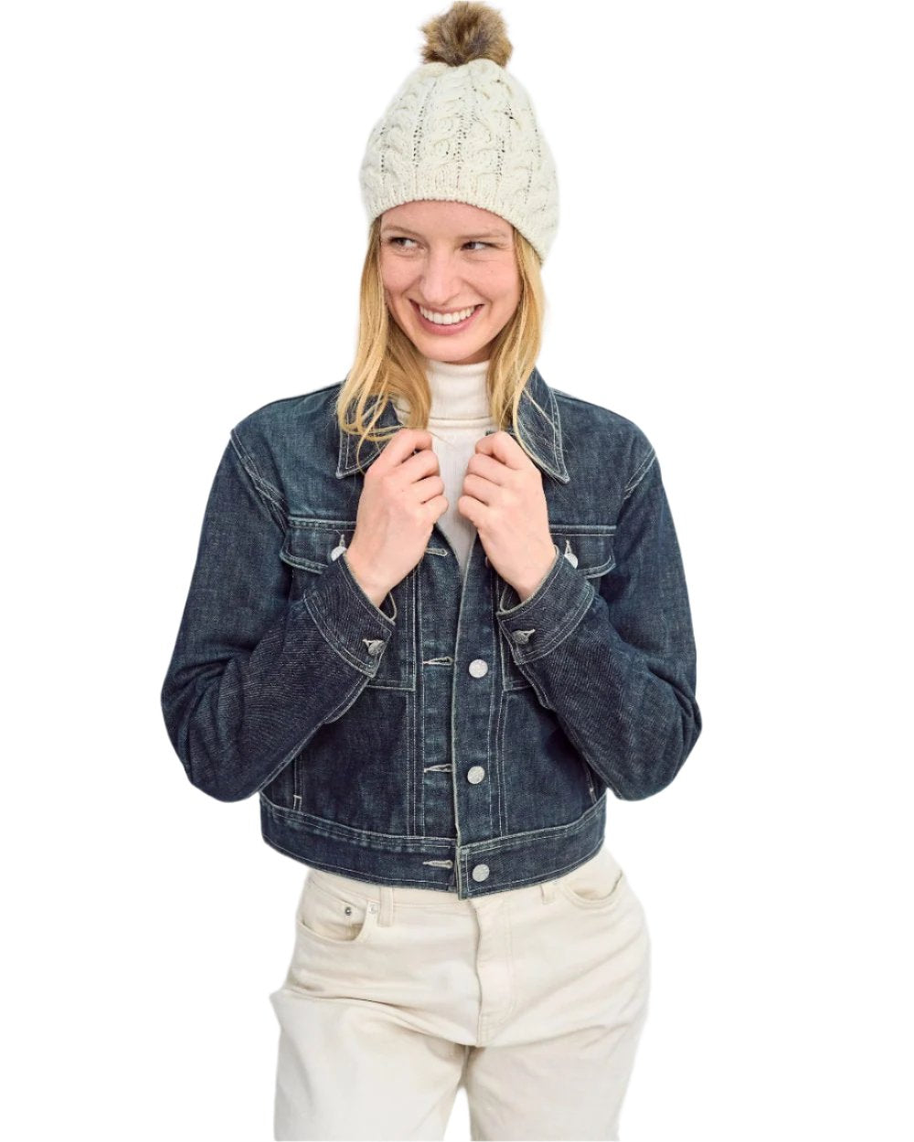 Cream Coloured Aran Knitted Faux Fur Bobble Hat on white background