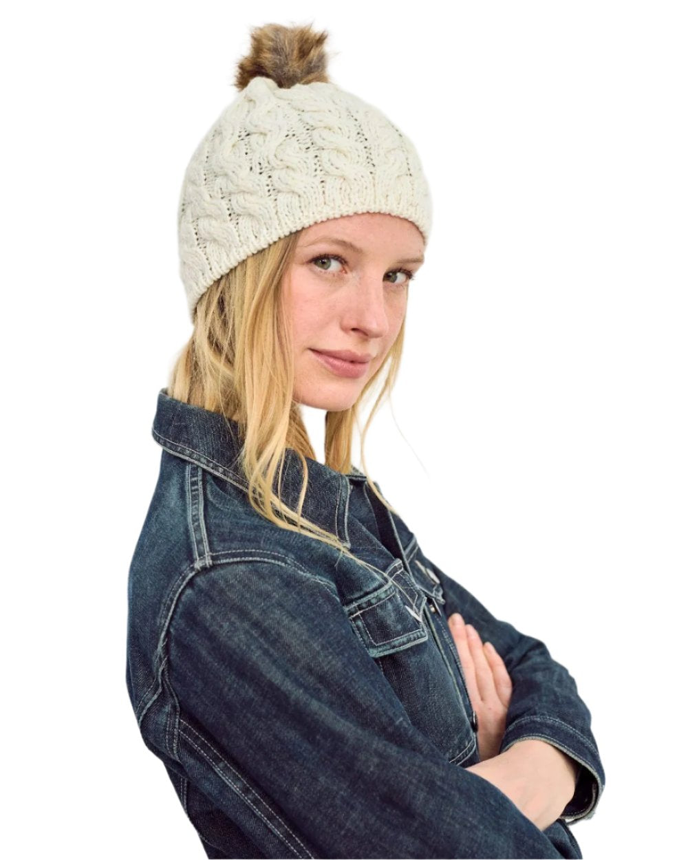 Cream Coloured Aran Knitted Faux Fur Bobble Hat on white background