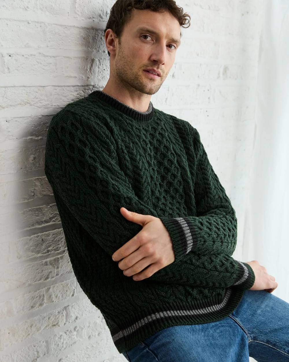 Green Coloured Aran Mens Inishbeg Stripe Crewneck Merino Sweater on indoor background