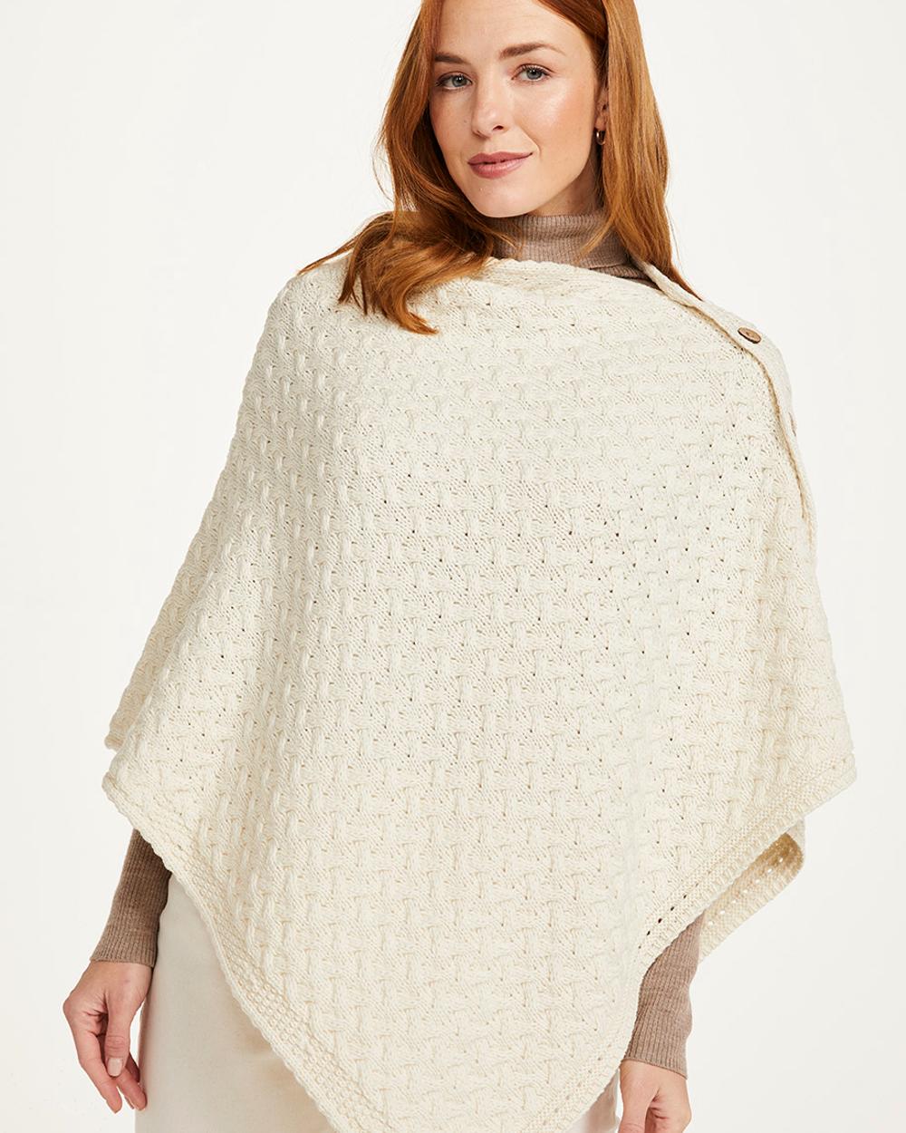 Cream Coloured Aran Merino Wool Knit Button Poncho on white background