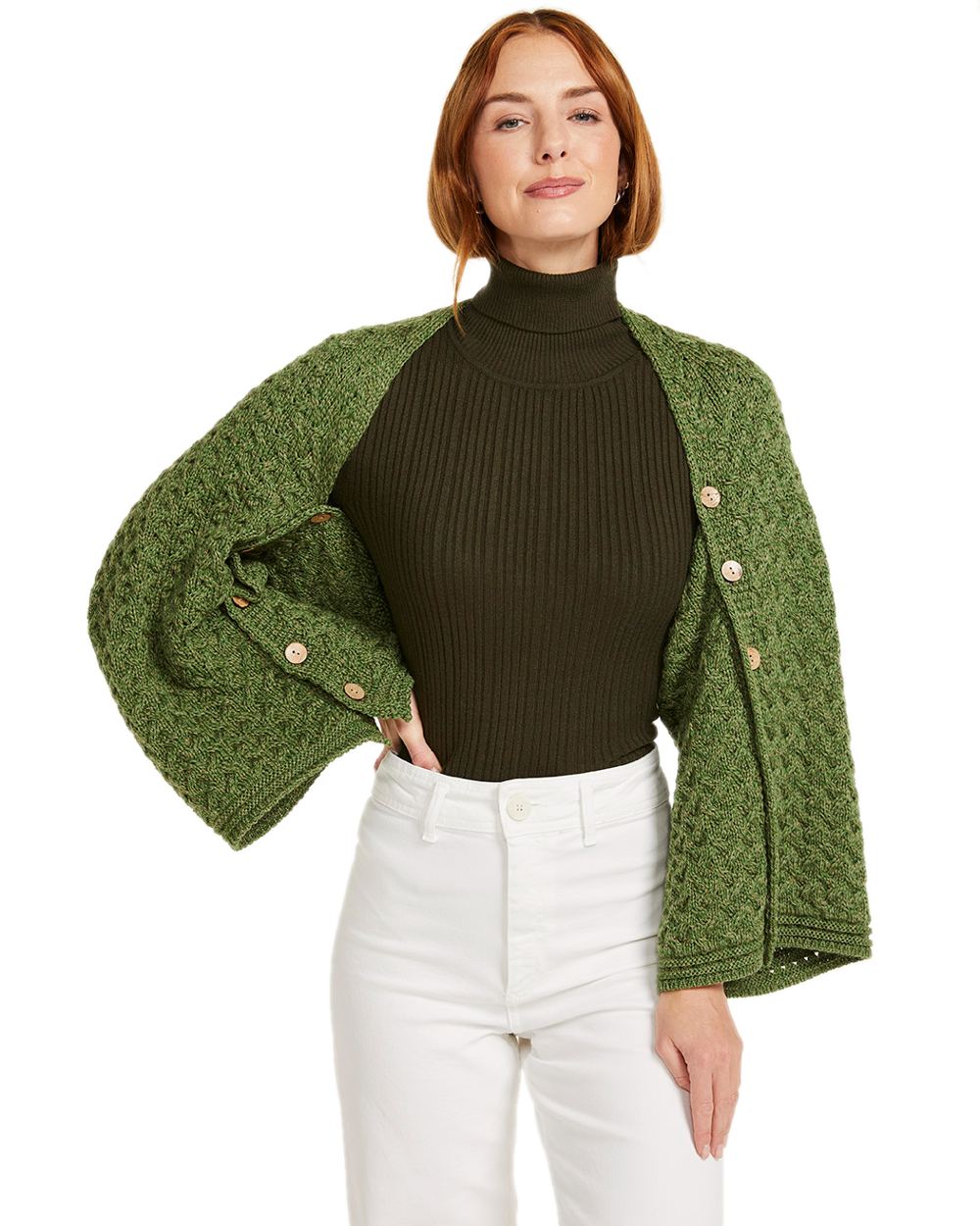 Sage Green Coloured Aran Merino Wool Knit Button Poncho on white background