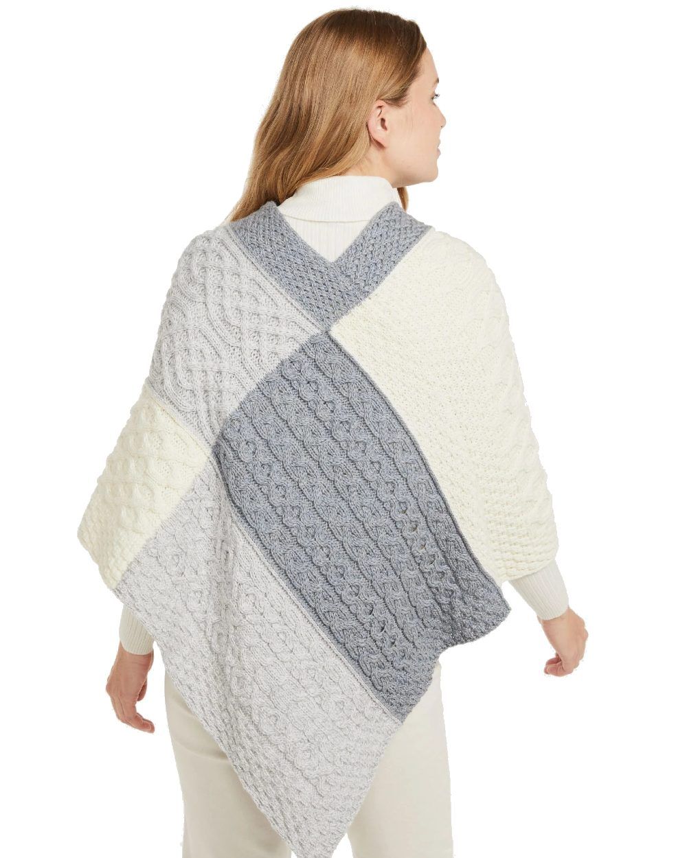 Dawn Coloured Aran Salthill Poncho on white background