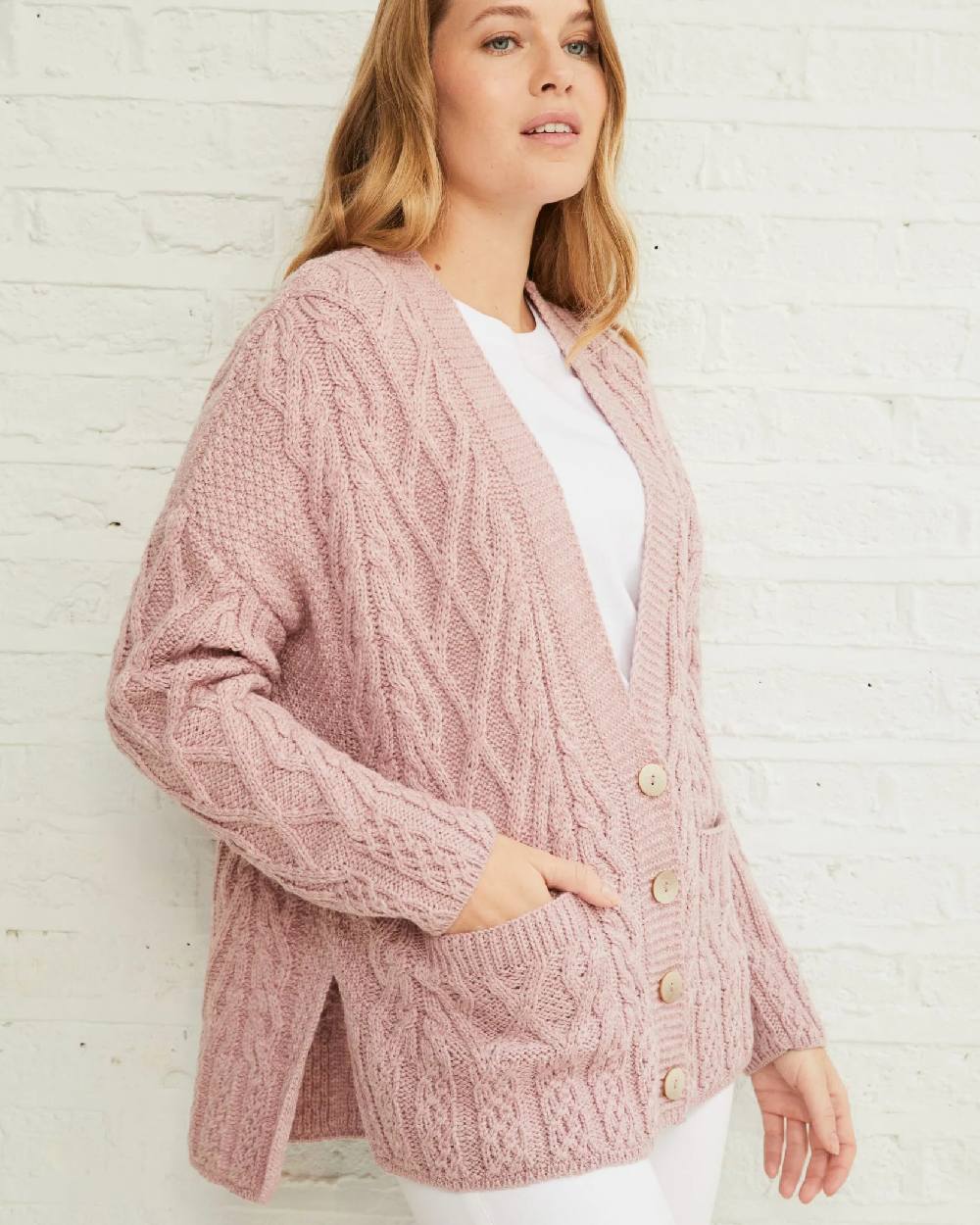 Blush Pink Coloured Aran Valentia Trellis Womens Cardigan on grey background