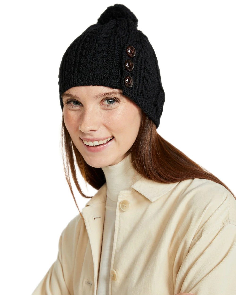 Black Coloured Aran Womens Cong Hat With Pom Pom on white background
