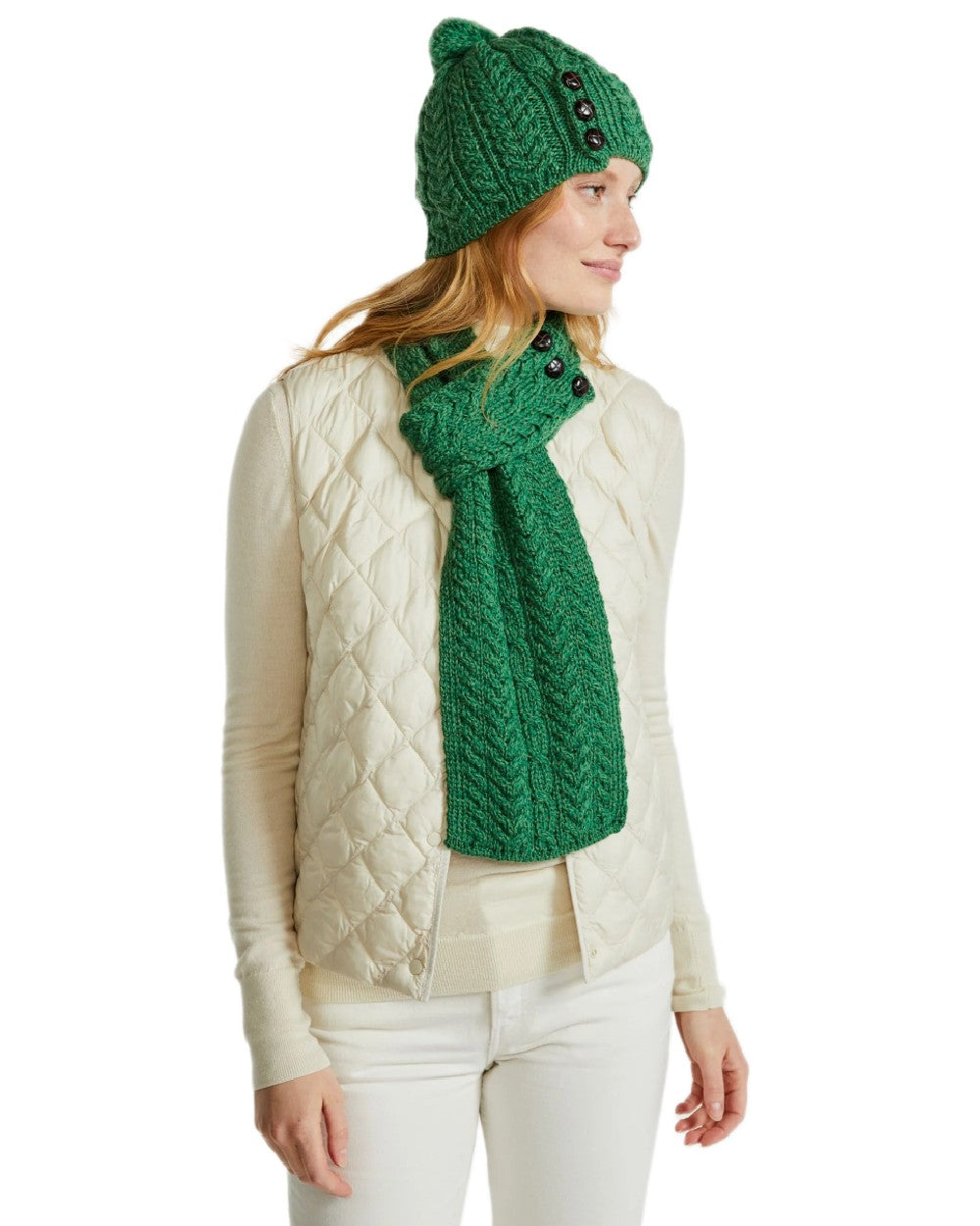 Green Coloured Aran Womens Cong Hat With Pom Pom on white background