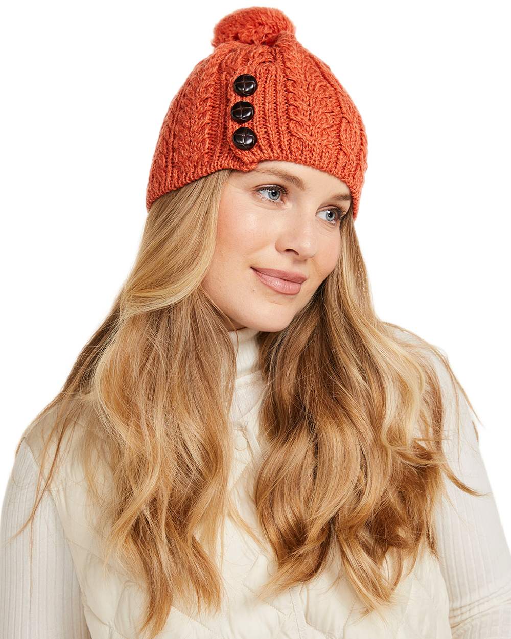 Red Orange Coloured Aran Womens Cong Hat With Pom Pom on white background