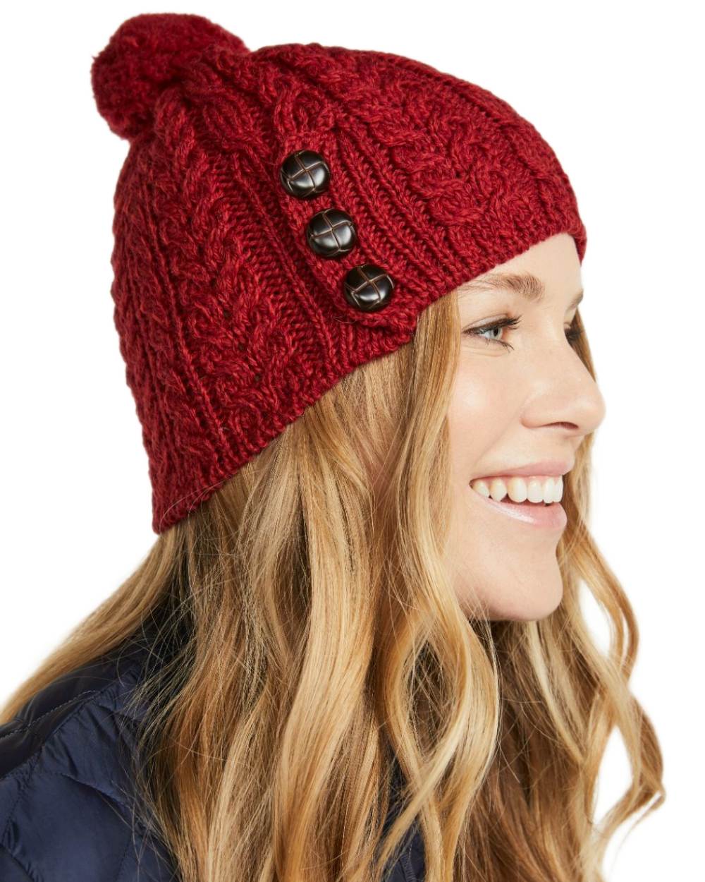 Red Coloured Aran Womens Cong Hat With Pom Pom on white background