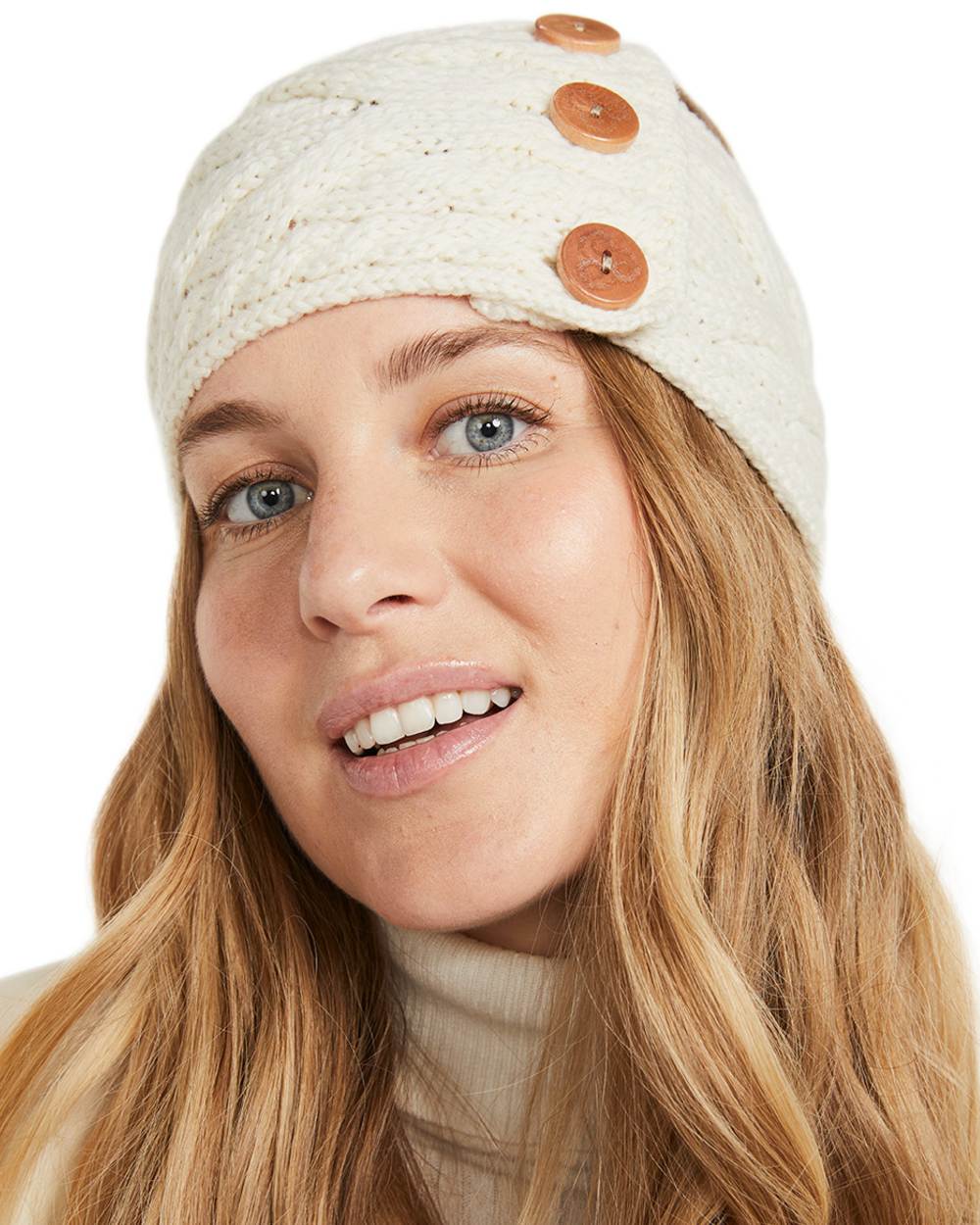 Cream coloured Aran Womens Multi Cable Headband With Buttons on white background