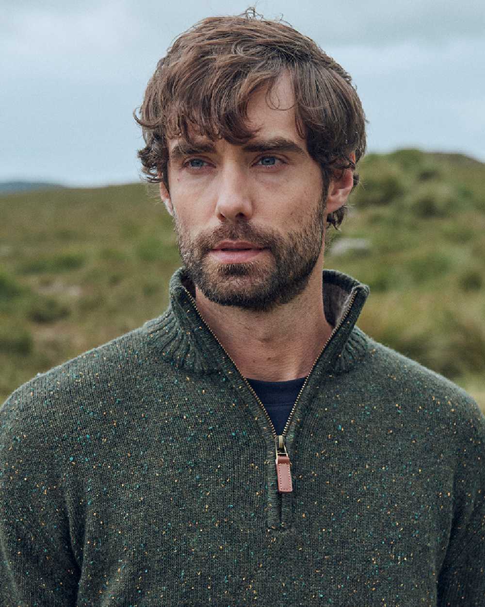 Green Coloured Aran Wool Zip Neck Sweater on mountain background