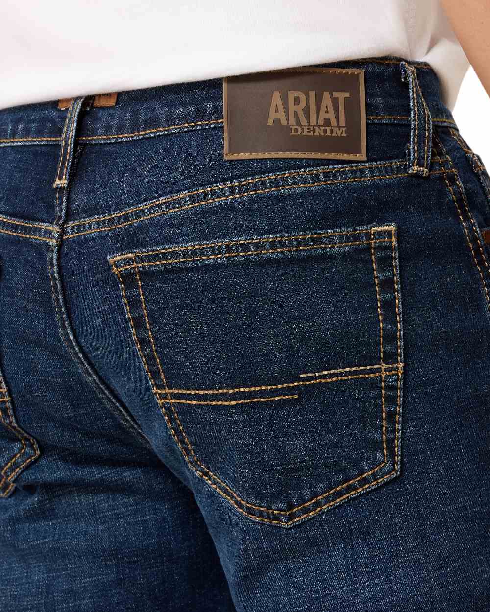 Kyle coloured Ariat Mens M8 Slim Taper Hansen Straight Leg Jeans on white background