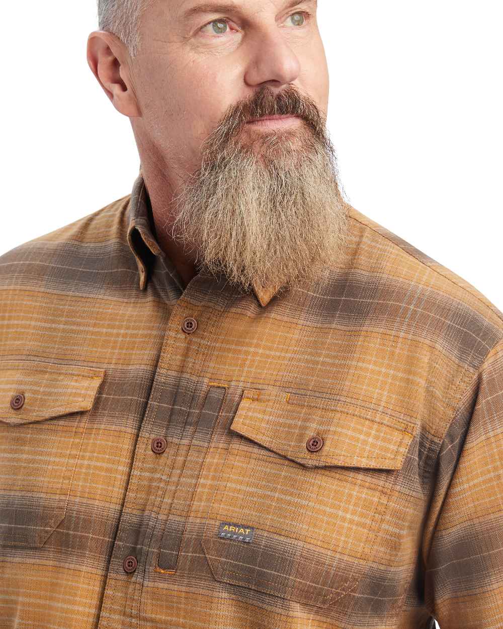 Sand coloured Ariat Rebar Flannel Durastretch Work Shirt on white background
