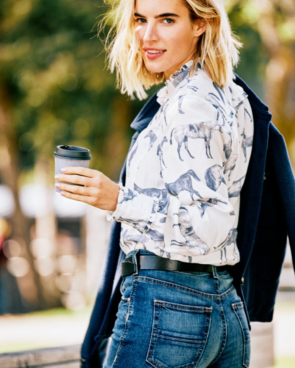 Hand Print coloured Ariat Womens Clarion Blouse on Blurry Park background