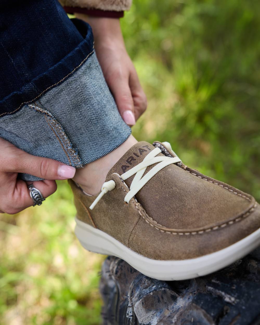 Brown Bomber coloured Ariat Womens Hilo Shoes on outdoor background