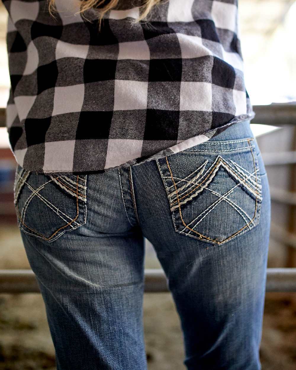 Rainstorm Coloured Ariat Womens Real Mid Rise Stretch Whipstitch Boot Cut Jeans on blurry background