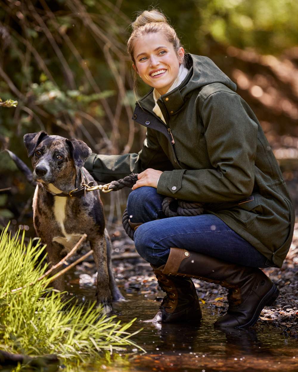 Rosin coloured Ariat Womens Rhodium Waterproof Insulated Parka on forest background