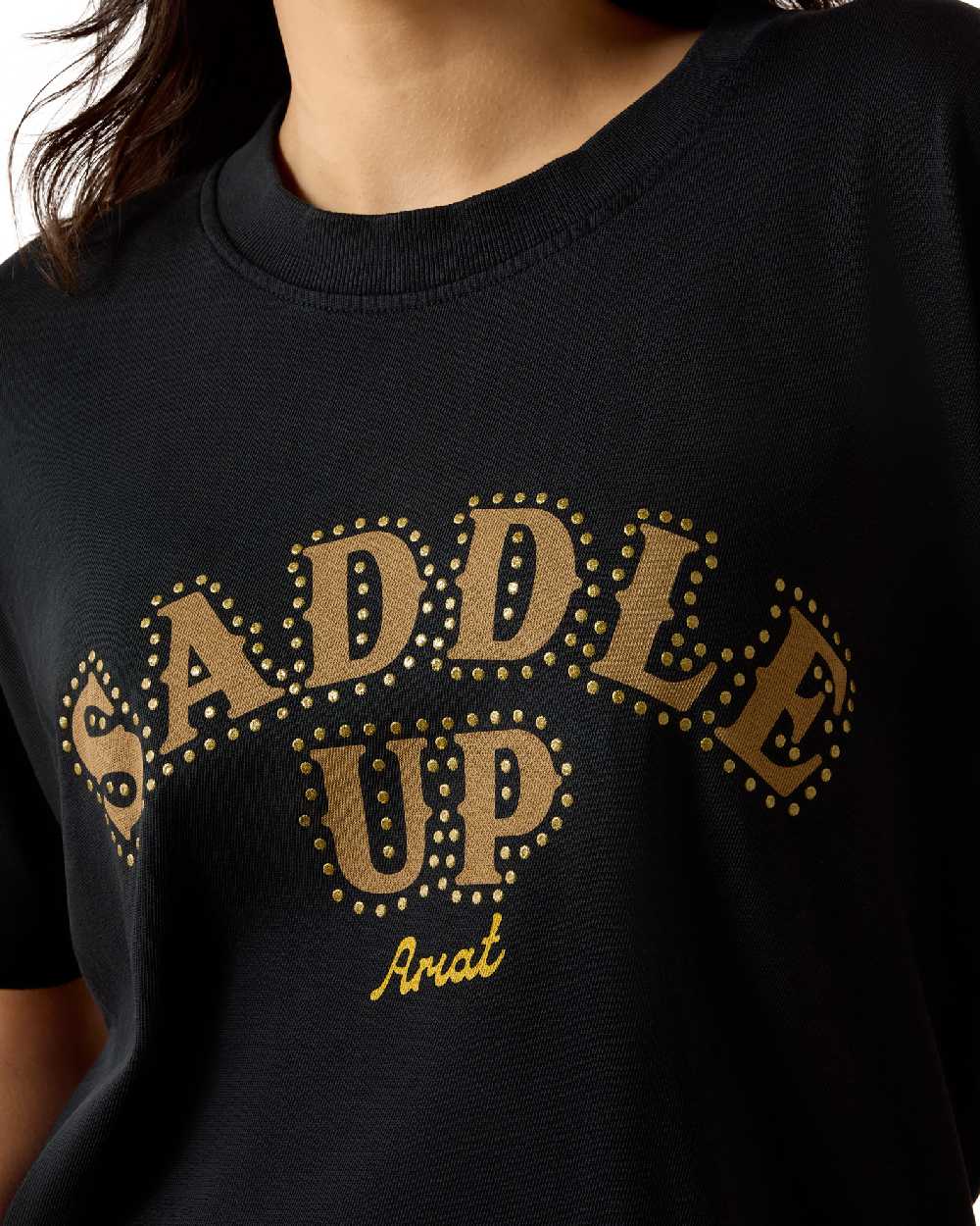 Pigment Black coloured Ariat Womens Saddle Up Boyfriend T Shirt on white background