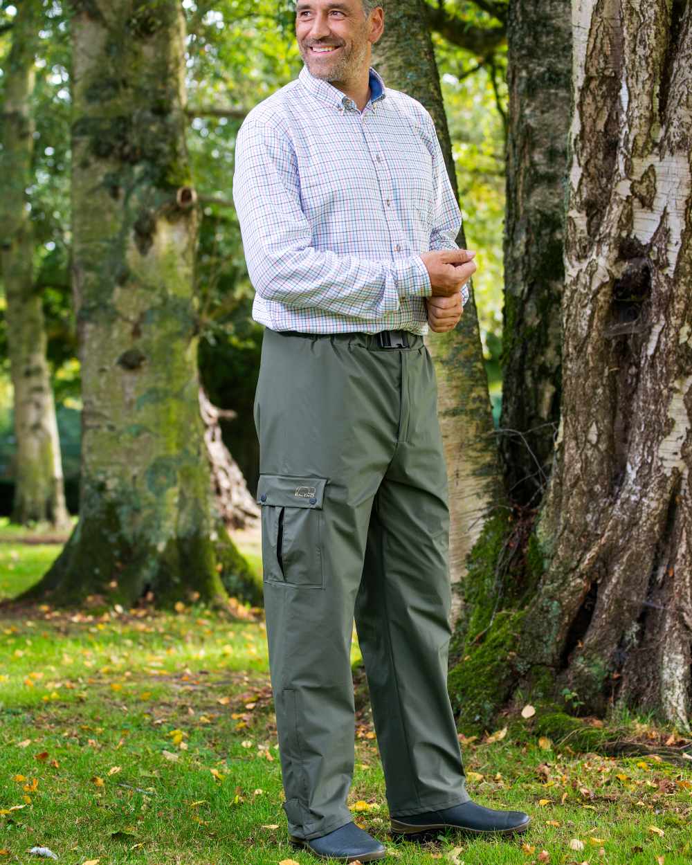 Khaki Coloured Baleno Cartouche Flexothane Rain Trousers on forest background
