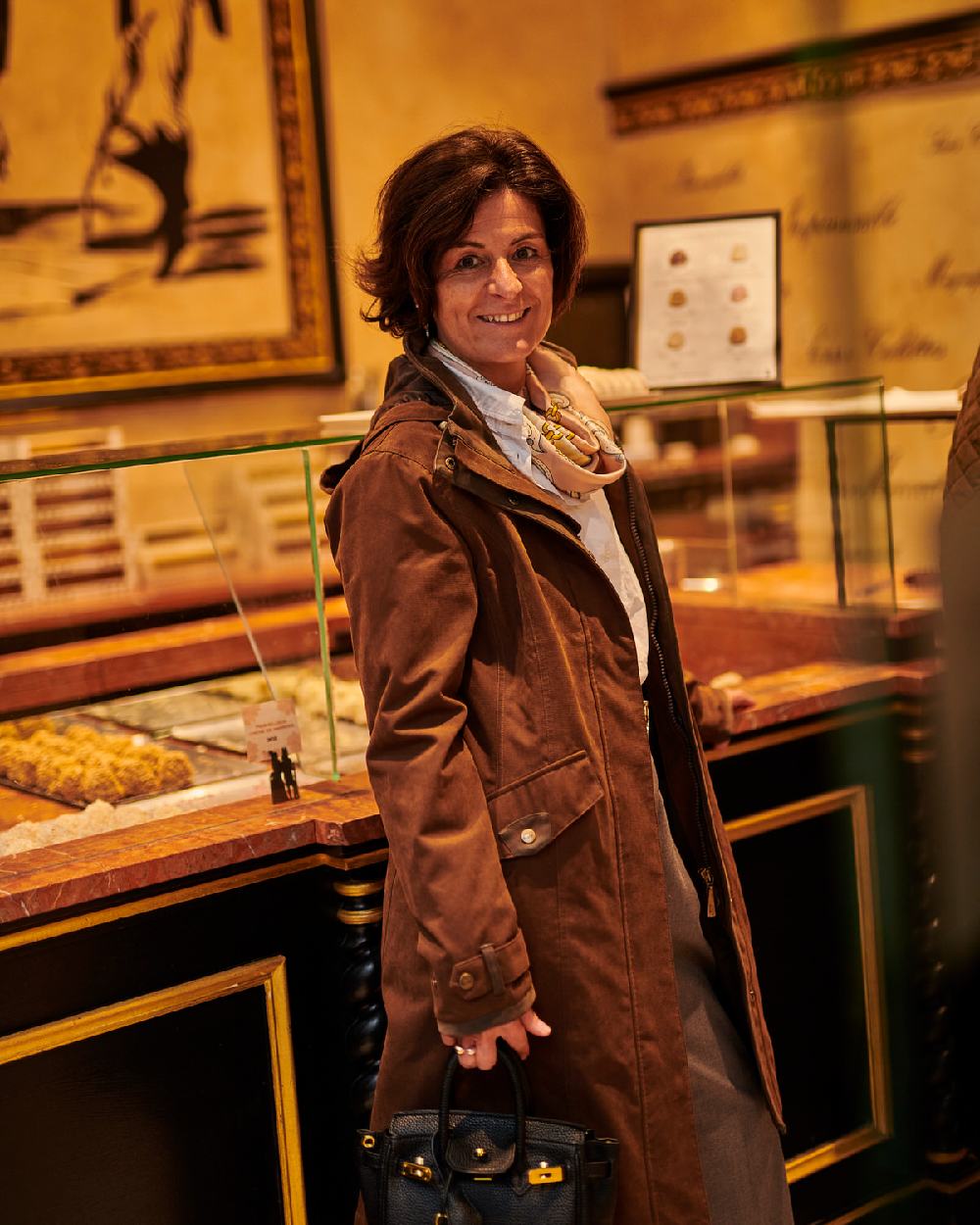 Brown Coloured Baleno Chelsea Mid Length Coat on shop background