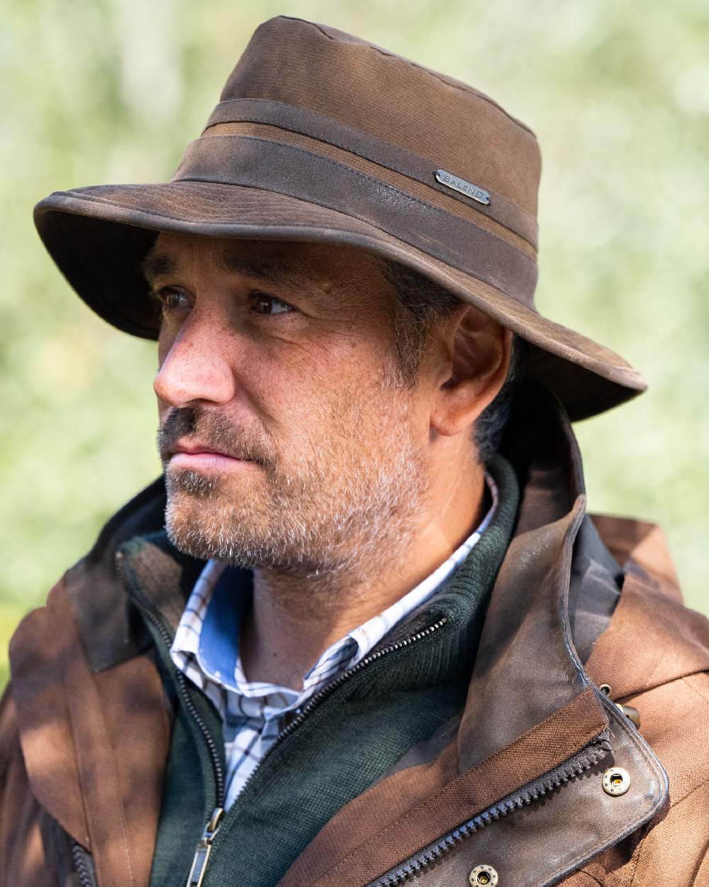 Earth Brown Coloured Baleno Edith Waterproof Hat on blurry background