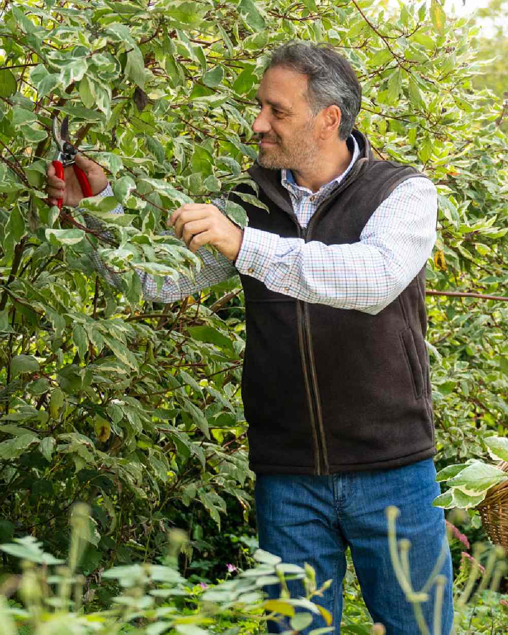 Chocolate Coloured Baleno Harvey Fleece Gilet on garden background