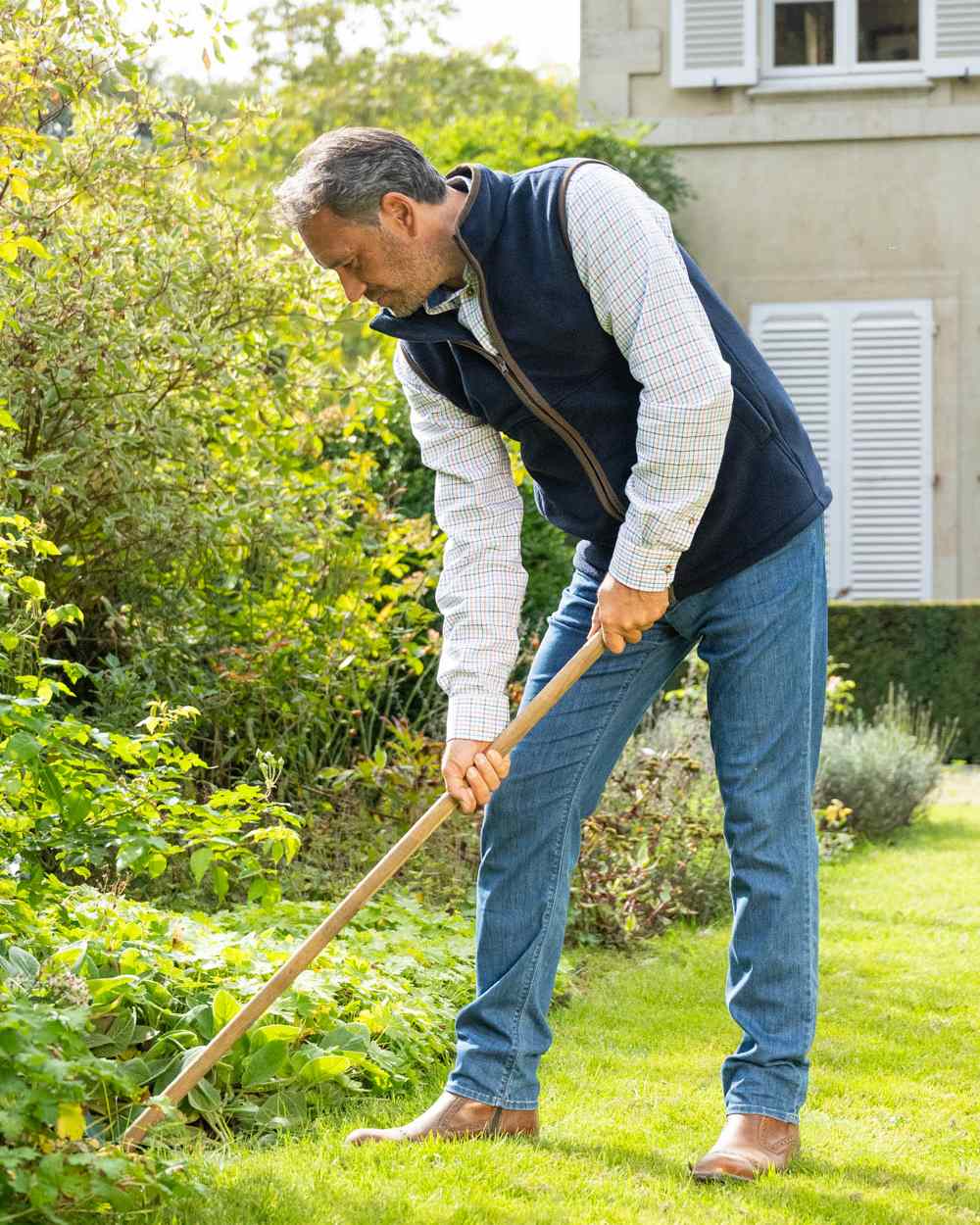 Navy Blue Coloured Baleno Harvey Fleece Gilet on garden background