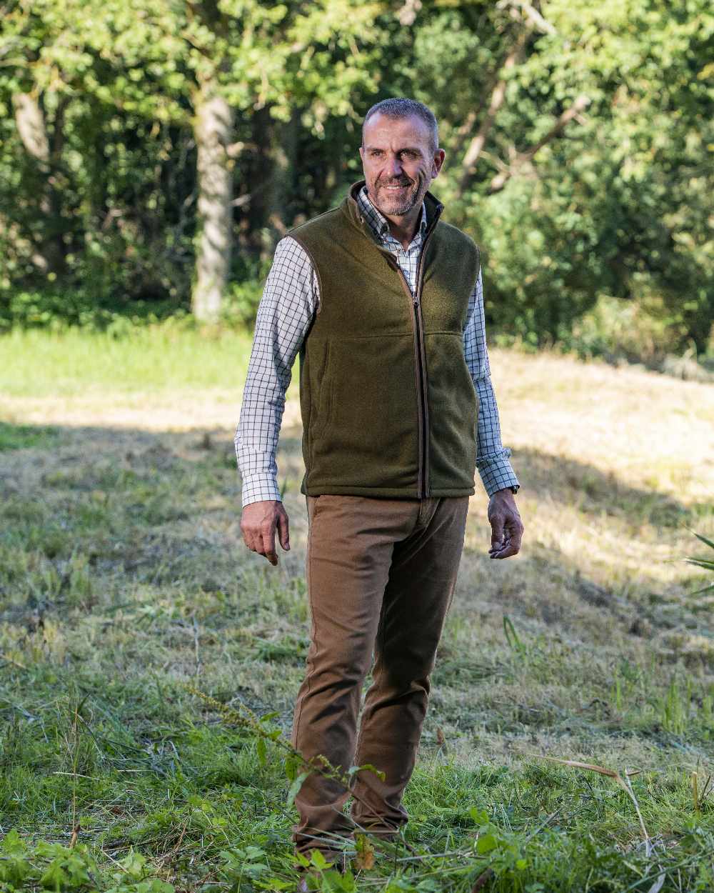Olive Coloured Baleno Harvey Fleece Gilet on forest background