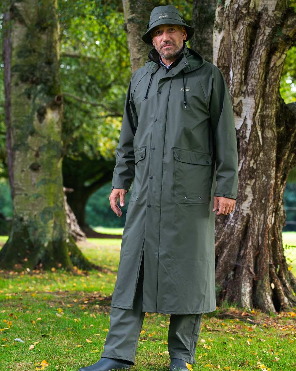 Green Khaki Coloured Baleno Helsinki Long Raincoat on nature background