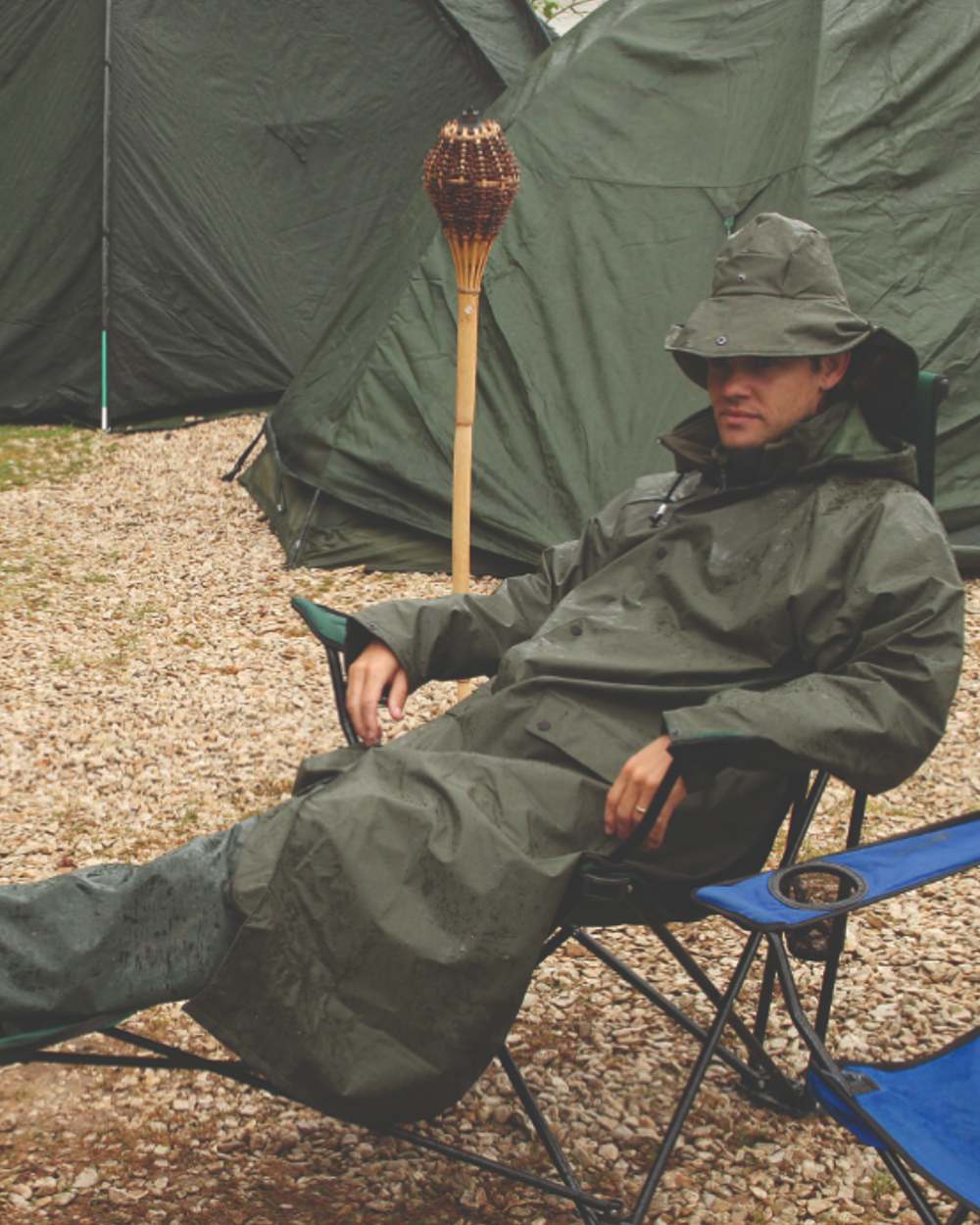 Green Khaki Coloured Baleno Helsinki Long Raincoat on camps background