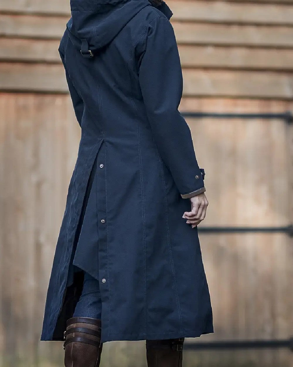 Dark Blue coloured Baleno Kensington Warm Long Waterproof Coat on blurry background