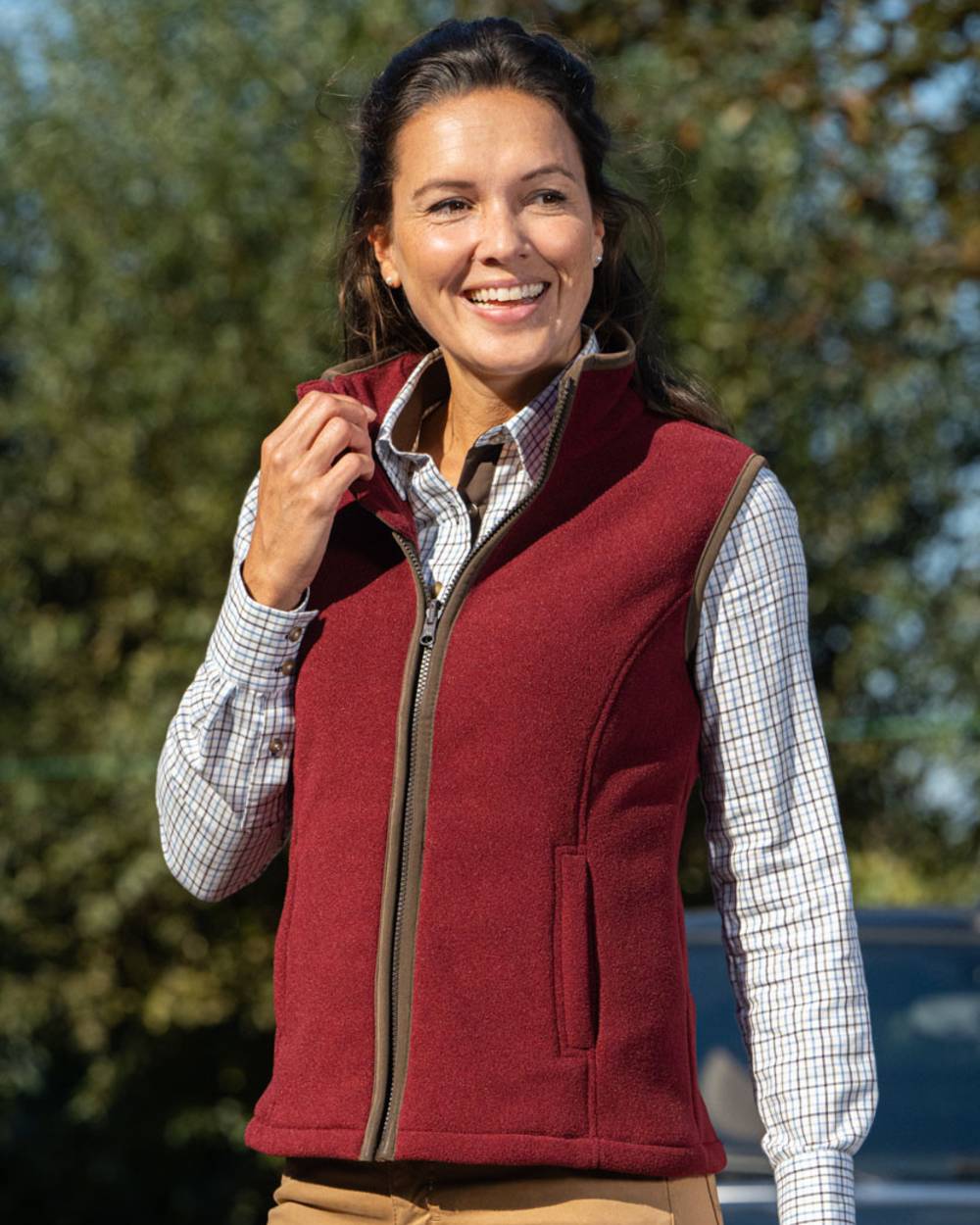 Burgundy Red coloured Baleno Sally Ladies Fleece Gilet on outdoor background