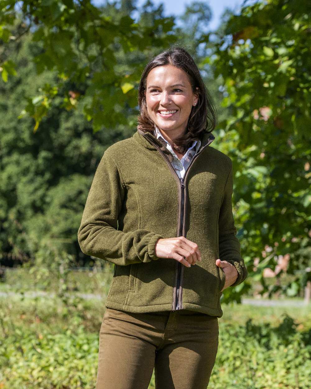 Olive Coloured Baleno Sarah Fleece Jacket on forest background