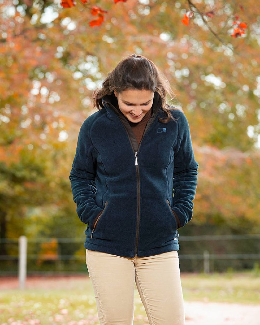 Navy Blue Coloured Baleno Southwell Waterproof Fleece Jacket on blurry background