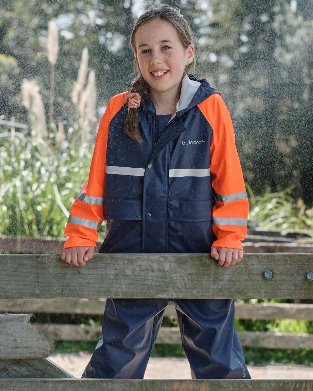 Navy Orange coloured Betacraft Childrens Tuffbak Overtrousers on white background