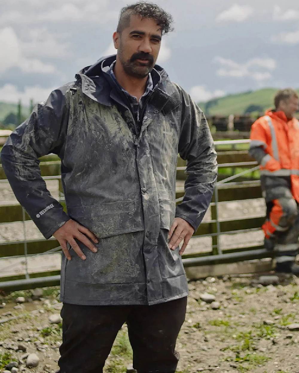 Navy coloured Betacraft Mens Techniflex Parka on farm background