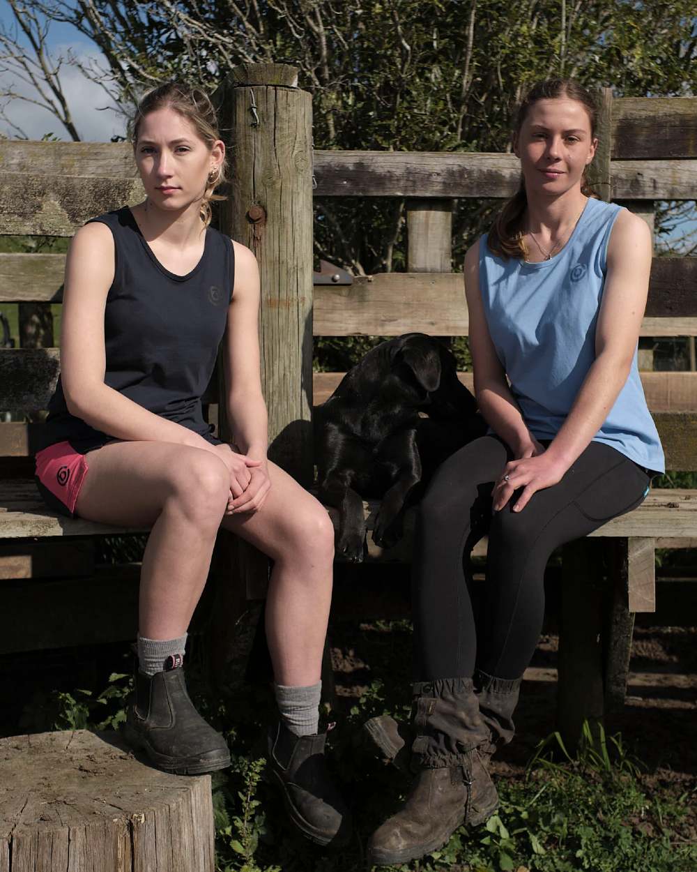 Dark Navy Hot Pink coloured Betacraft Station Shorts 3 on farm background